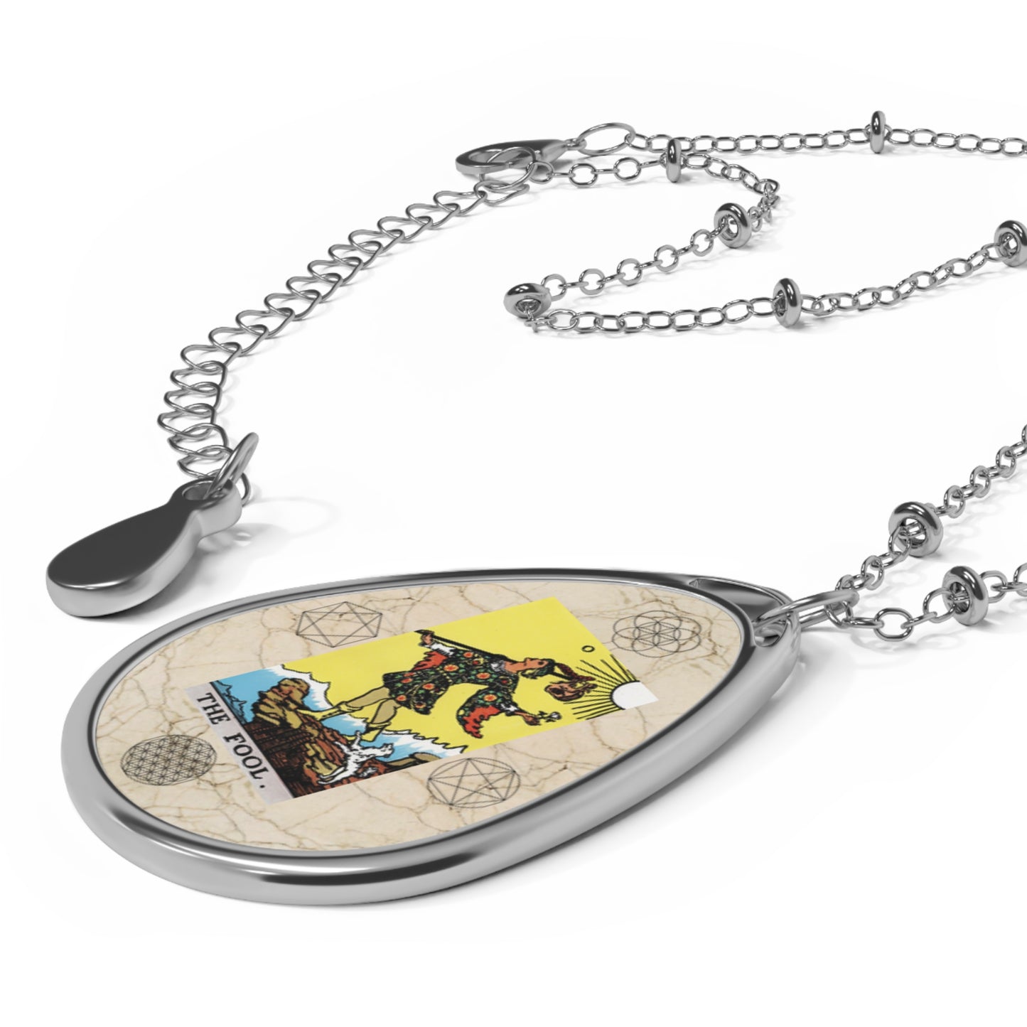 The Fool Tarot Card Pendant with Marble Background, Flower of Life, and Seed of Life